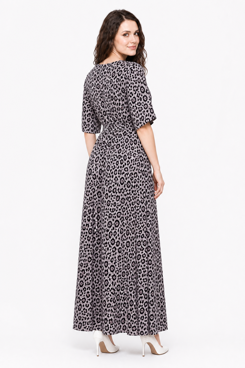 Zena wearing the Avamia River Maxi Dress in a three-quarter back view