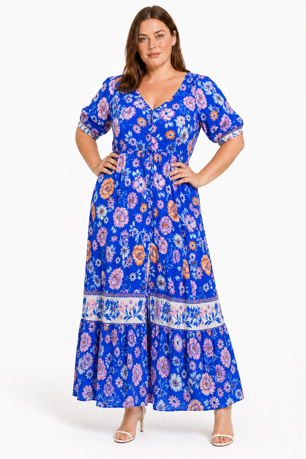 Jia wearing the Lavinia Dream blue floral maxi dress, front view with hands on hips
