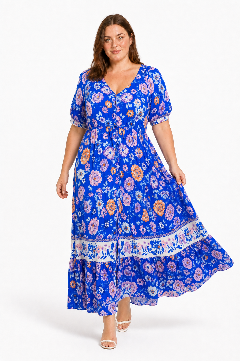 Jia walking in the Lavinia Dream blue floral maxi dress, showing its flowing skirt
