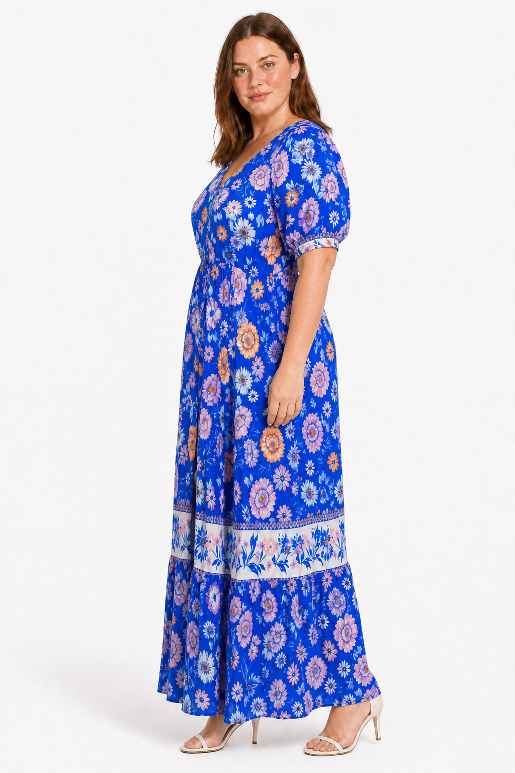 Jia wearing the Lavinia Dream blue floral maxi dress in side profile