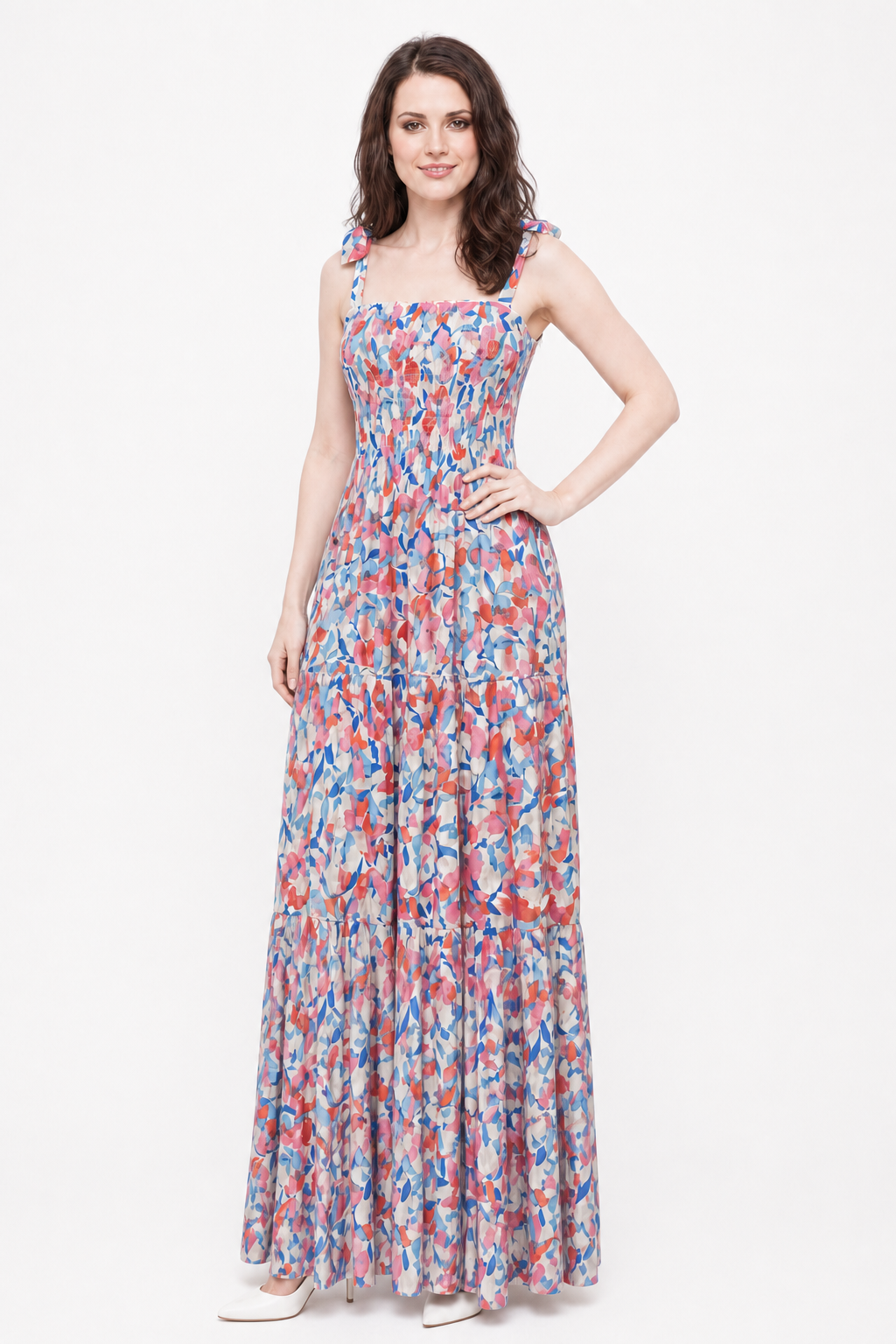 Cherry Blossom Maxi three-quarter view on Zena with one hand on hip in a white studio.