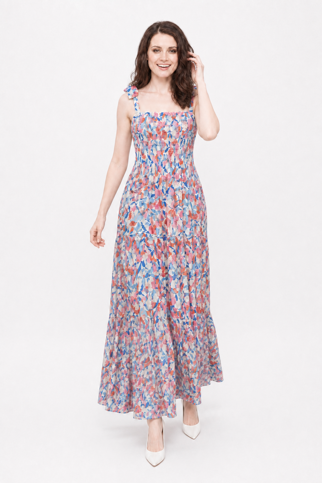 Cherry Blossom Maxi on Zena walking toward camera with one hand in her hair.