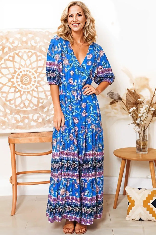 Boho Lane Australia blue floral maxi dress with 3 quarter sleeves and V-neck on smiling woman indoors