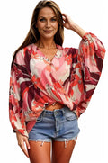 Boho Lane Australia bohemian floral wrap top with vibrant red and pink patterns and balloon sleeves